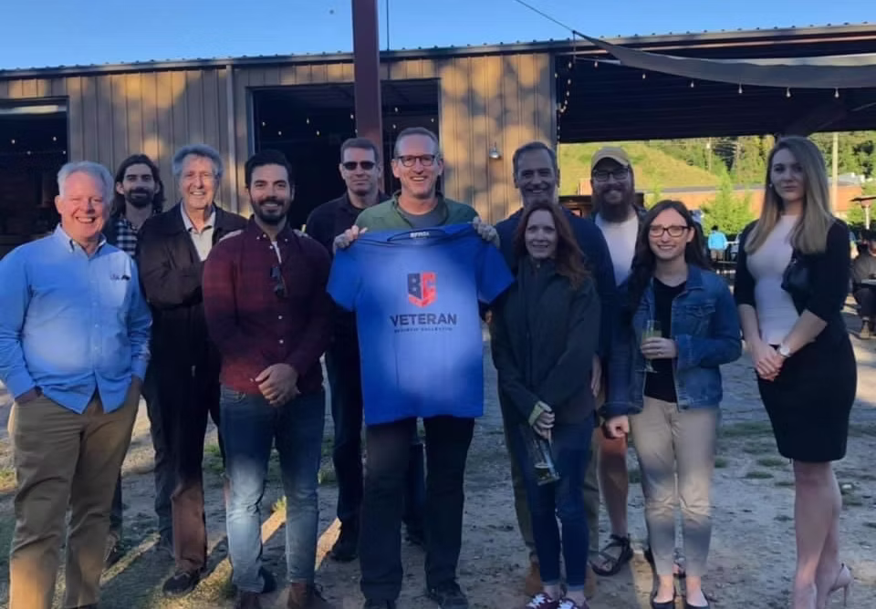 VBC members in branded apparel at an outdoor gathering